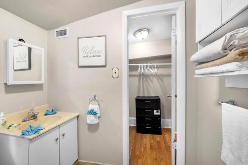a bathroom with a sink and a shower at Beautiful 2bdrm Large Flat Univ City in Philadelphia