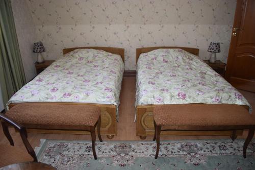 Katil atau katil-katil dalam bilik di Hotel Miss Mari