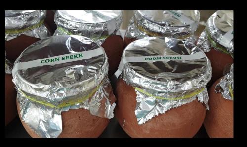 a group of bun wrapped in tin foil at Sai Celebrations Inn Shirdi in Shirdi