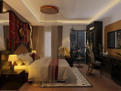 a bedroom with a bed and a desk and a chair at Hanoi Center Silk Classic Hotel & Travel in Hanoi