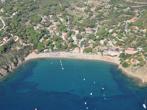 an aerial view of a beach with boats in the water at Residence Antonella in Capoliveri