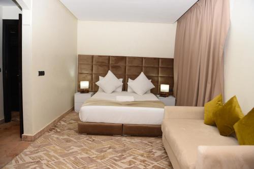 Un ou plusieurs lits dans un hébergement de l'établissement éden de la palmeraie