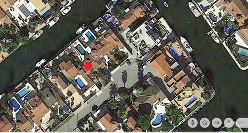 an aerial view of a bunch of houses and cars at Jouvacations Villa Noguera in Empuriabrava