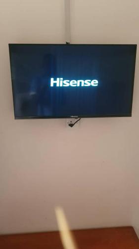 Televisyen dan/atau pusat hiburan di CAPITAL HILL REST HOUSE