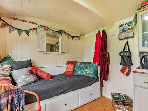 a room with a bed in a small room at 1 Bed in Coleford 91373 in Bream