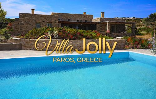 a villa july sign in front of a house at Luxury Villa Jolly in Paros Isterni in Isterni