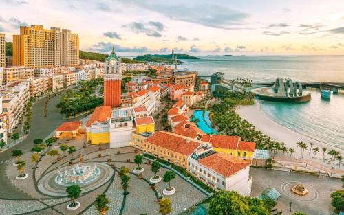 an aerial view of a city with a clock tower at LITTLE PHU QUOC STUDIO in Phú Quốc