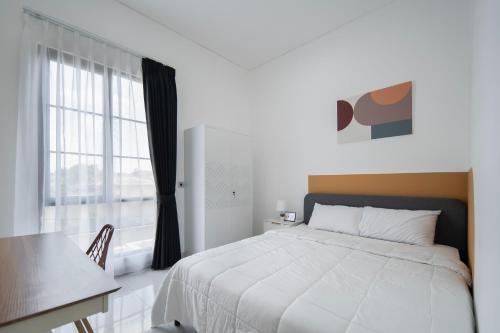 Postel nebo postele na pokoji v ubytování Cove River Haus