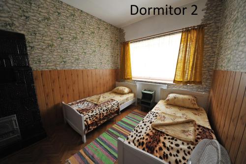 Кровать или кровати в номере Casa Kapti