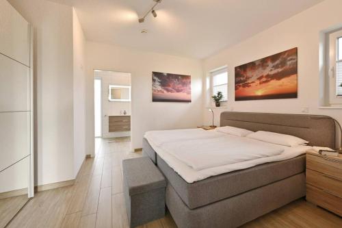 En eller flere senger på et rom på Villa Strandgut