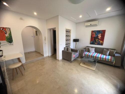 Ruang duduk di Studio malaga rez du chaussée neuf