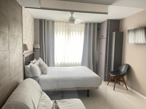 Postel nebo postele na pokoji v ubytování Apartamentos Las Vegas