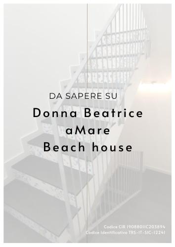 a spiral staircase with the words dane beach house at Donna Beatrice aMare beach house in Donnalucata