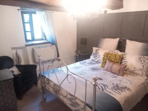 En eller flere senge i et værelse på Sotto il fico