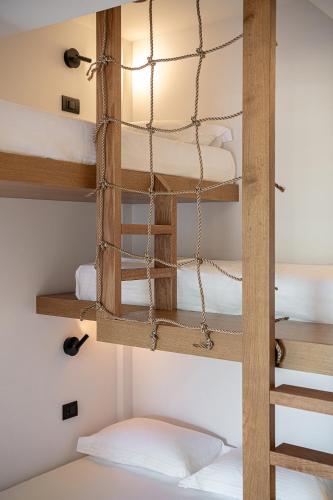 a room with bunk beds in a hostel at Brand new Villa Eleftheria BY APOKORONAS-VILLAS in Plaka