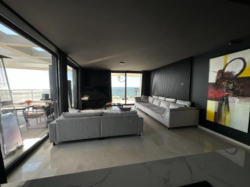 SUNSET CLIFFS VIP APARTMENTにあるシーティングエリア