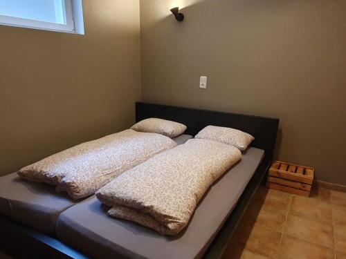 Een bed of bedden in een kamer bij Holiday home Haus Bramberg
