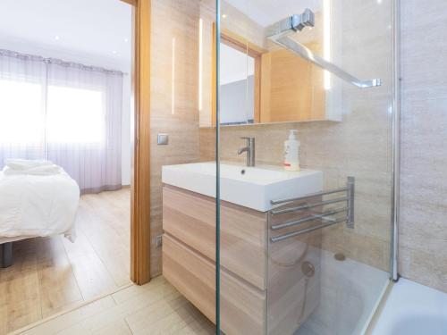 a bathroom with a sink and a shower at Cubo's Beach Side Apartment at La Cala in La Cala de Mijas