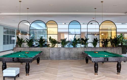 a billiard room with two pool tables at Rixos Premium Dubrovnik in Dubrovnik