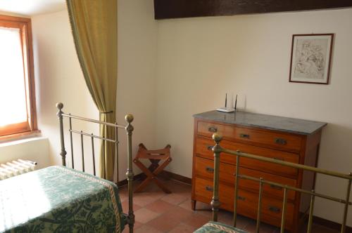 Ένα ή περισσότερα κρεβάτια σε δωμάτιο στο Agriturismo Pantano Borghese