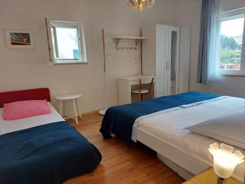 Postel nebo postele na pokoji v ubytování Beach House Albertina
