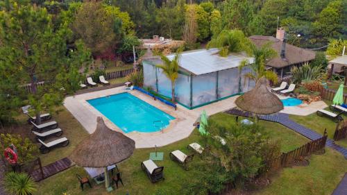 Resort 77 في بيريابوليس: صورة جوية لمنزل به مسبح