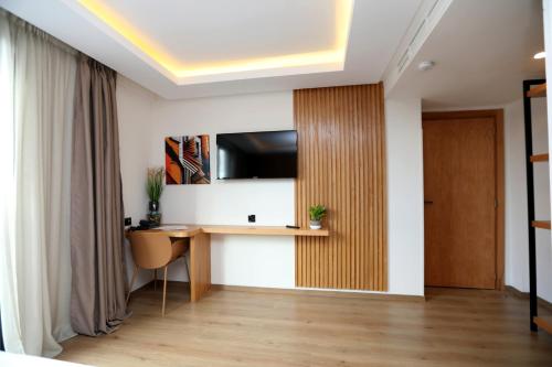 TV a/nebo společenská místnost v ubytování Unico Hotel & Spa Casablanca