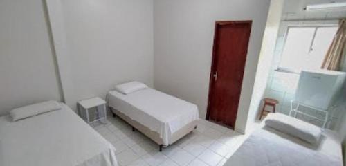 Ein Badezimmer in der Unterkunft SÃO CRISTOVÃO HOTEL