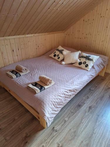 Postel nebo postele na pokoji v ubytování Przystań Mielnów
