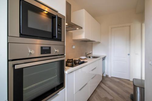 Dapur atau dapur kecil di Villa Margidore