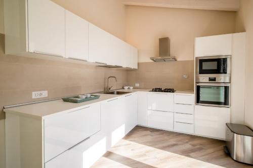 Dapur atau dapur kecil di Villa Margidore