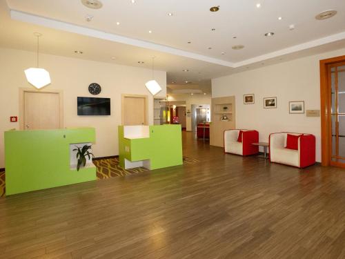 Istumisnurk majutusasutuses DORMERO Hotel Greifswald