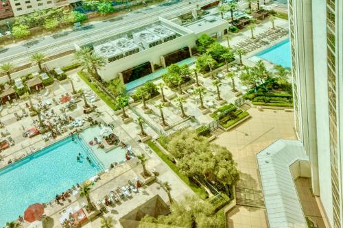 an aerial view of a building with two pools at Strip View Suites - No Resort Fee ! in Las Vegas