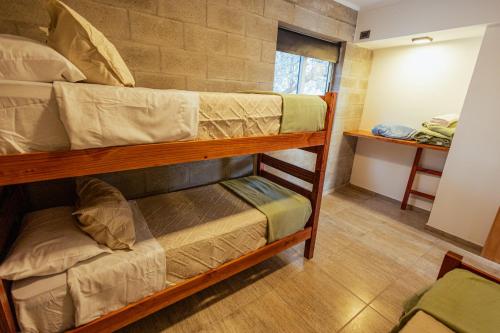 En eller flere senge i et værelse på Villa Lorenzo Apart