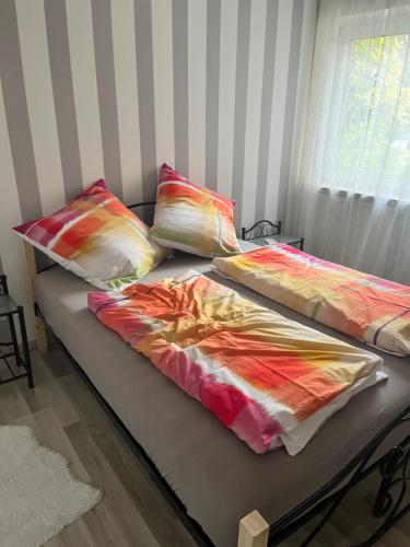 Postel nebo postele na pokoji v ubytování Wohnung mira