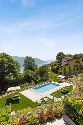 an image of a swimming pool in a yard at Residence Conca Verde 2 with pool in Trarego Viggiona