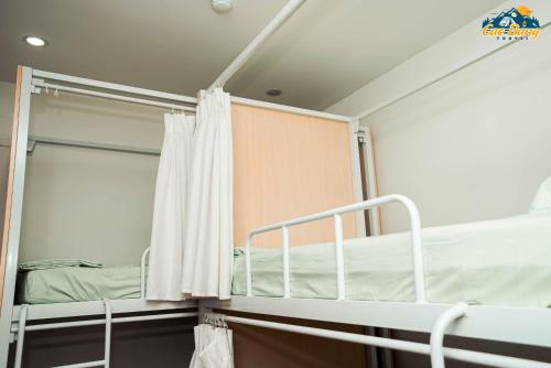 Poschodová posteľ alebo postele v izbe v ubytovaní Cốm Homestay Cao Bằng