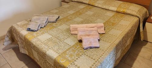 Postel nebo postele na pokoji v ubytování Casa Verga Ispica