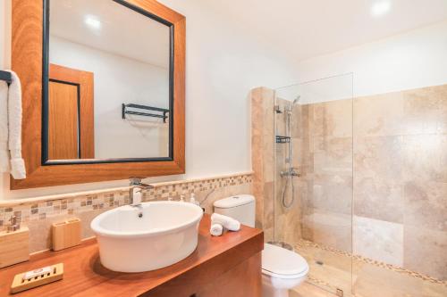 a bathroom with a sink and a shower at SPECIAL PRICE Puerto Bahia 3BR Villa in Santa Bárbara de Samaná