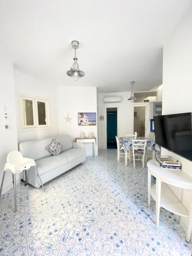 TV a/nebo společenská místnost v ubytování Arime Apartment