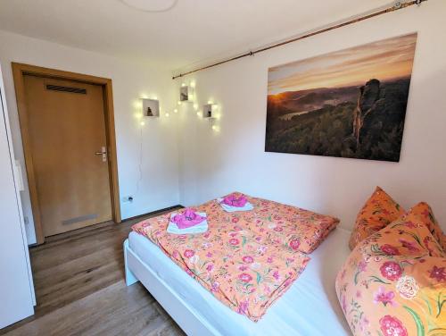 Ένα ή περισσότερα κρεβάτια σε δωμάτιο στο S3 - Urlaubsmagie - für 4P mitten im Elbsandsteingebirge