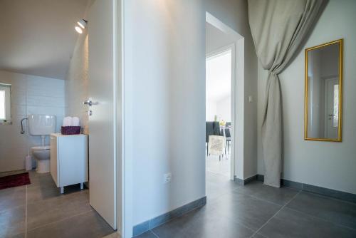 Koupelna v ubytování Apartments Sonata