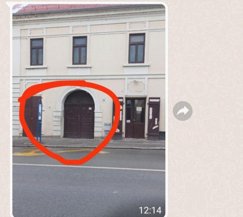 a red circle on a picture of a building at Room Angel in Petrovaradin