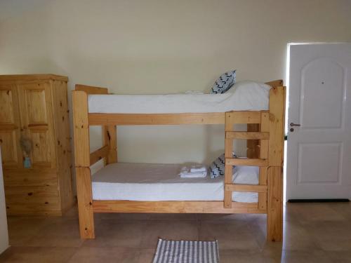 a set of bunk beds in a room at La Soñada II in Alta Gracia