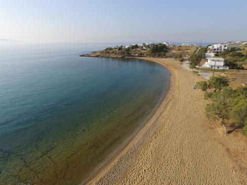an aerial view of a beach near the ocean at Nomads House in Logaras