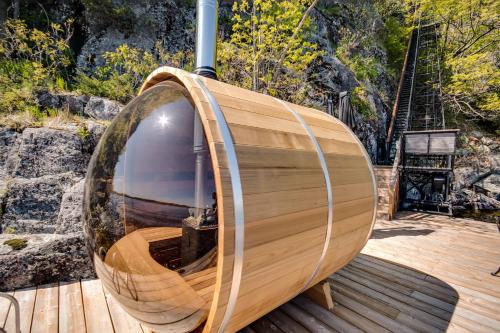 a wooden boat sitting on a wooden deck at Muskoka Rise in Rosseau