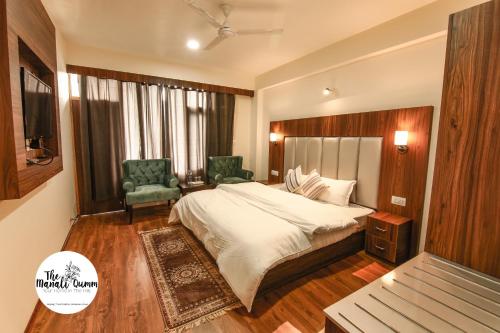 Posteľ alebo postele v izbe v ubytovaní Manali Qumm