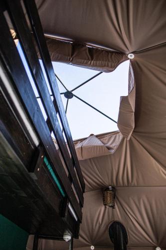 a ceiling of a tent with a window in it at BUNNY GLAMP in Korbielów