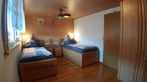 Letto o letti in una camera di Ferienhof Oberle