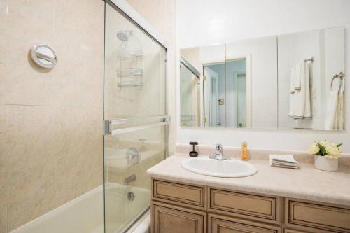 a bathroom with a sink and a shower at Pet Friendly Millcreek Home Close to Downtown/Mtns in Salt Lake City